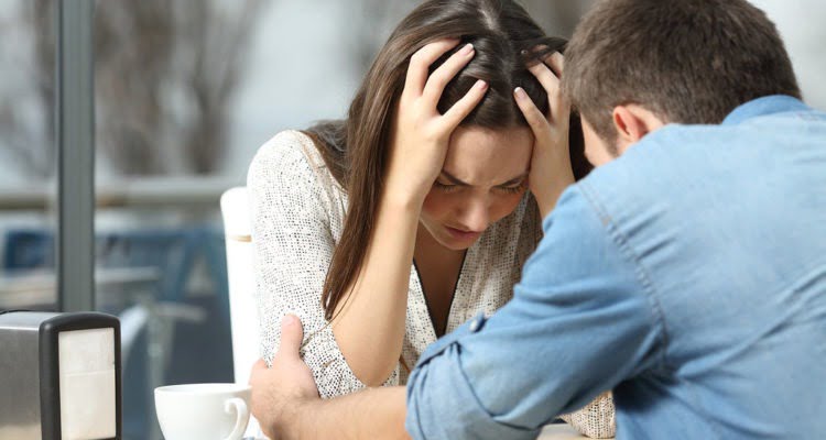 Man comforting woman | CFHP